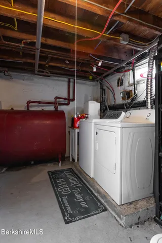 a view of kitchen with a sink and microwave
