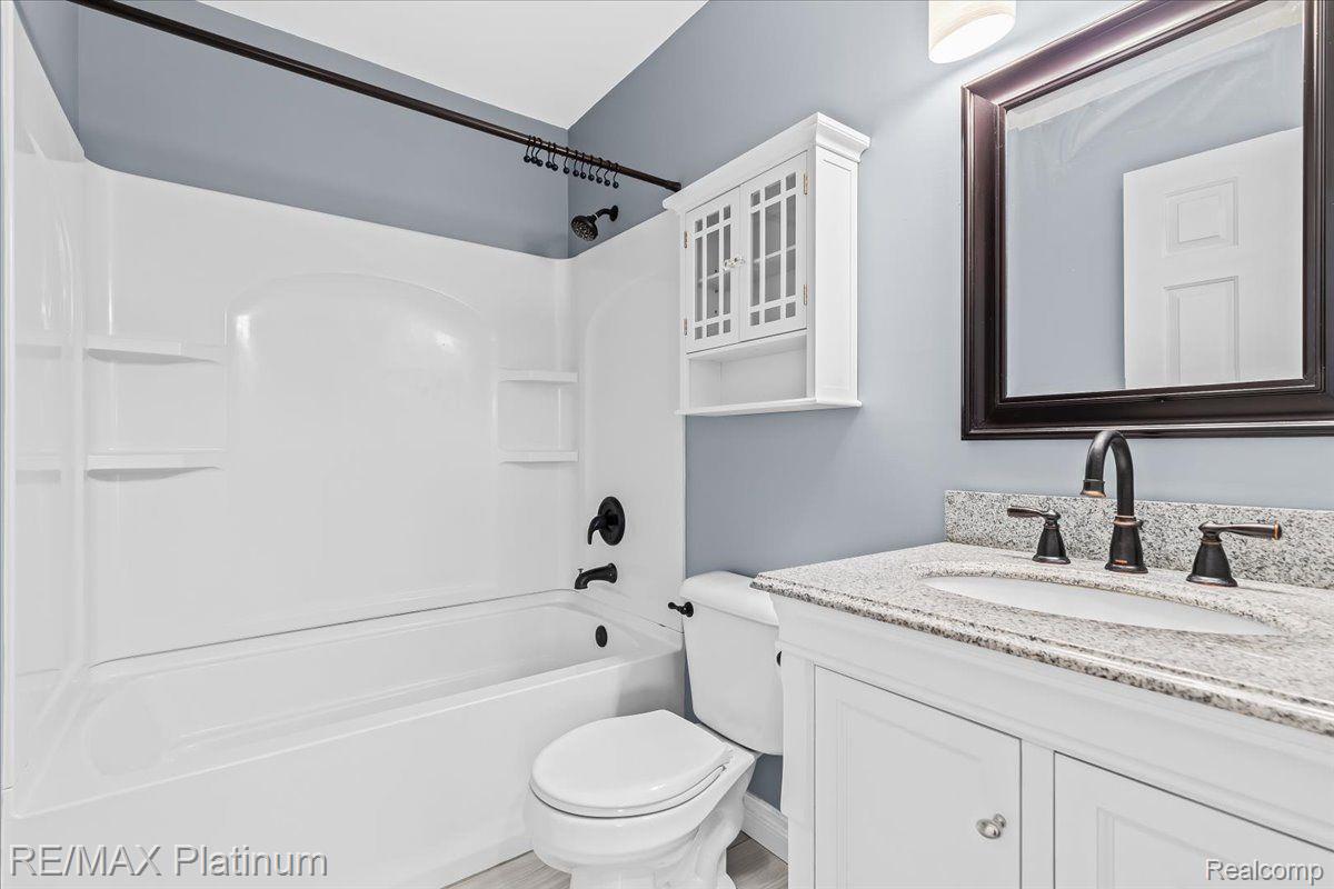 3980 Byron Road Howell, MI 48855 - Photo 36 of 47 Updated full bath w/ granite counter on 2nd level!