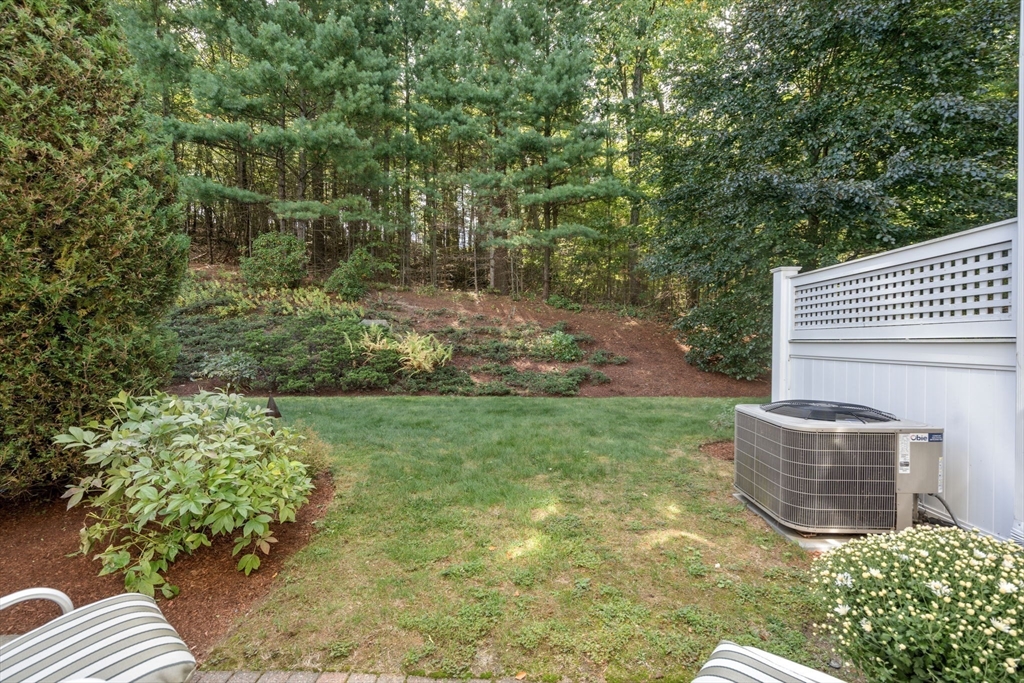 9 Highcroft Way, Unit 9 Hopkinton, MA 01748 - Photo 20 of 22 a view of yard from outdoor space