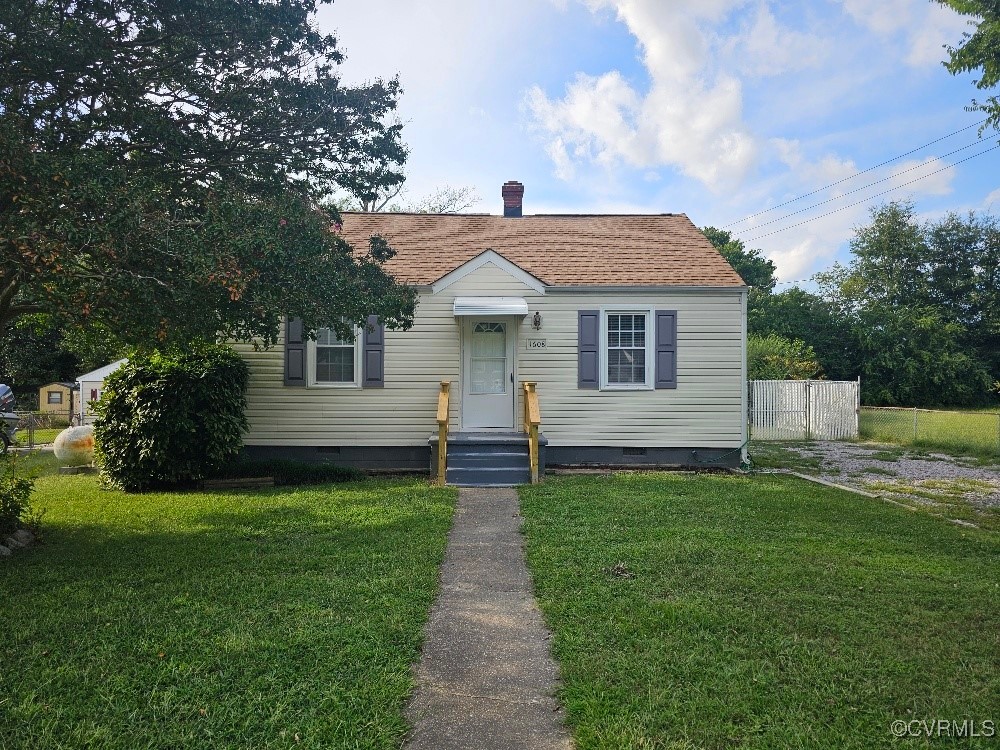 1608 Enon Church Road Chester, VA 23836 - Photo 1 of 8 a front view of house with yard and green space