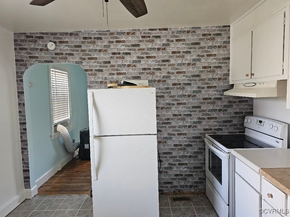 1608 Enon Church Road Chester, VA 23836 - Photo 4 of 8 a kitchen with a refrigerator and a stove