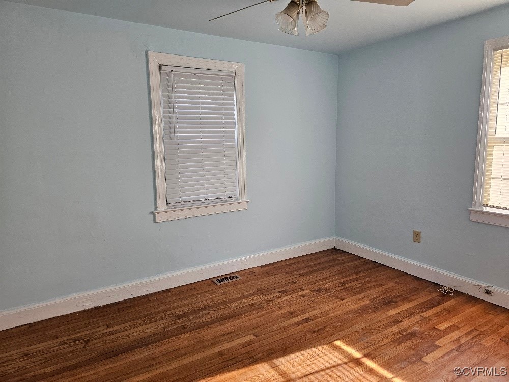 1608 Enon Church Road Chester, VA 23836 - Photo 6 of 8 a view of a room with wooden floor and a window