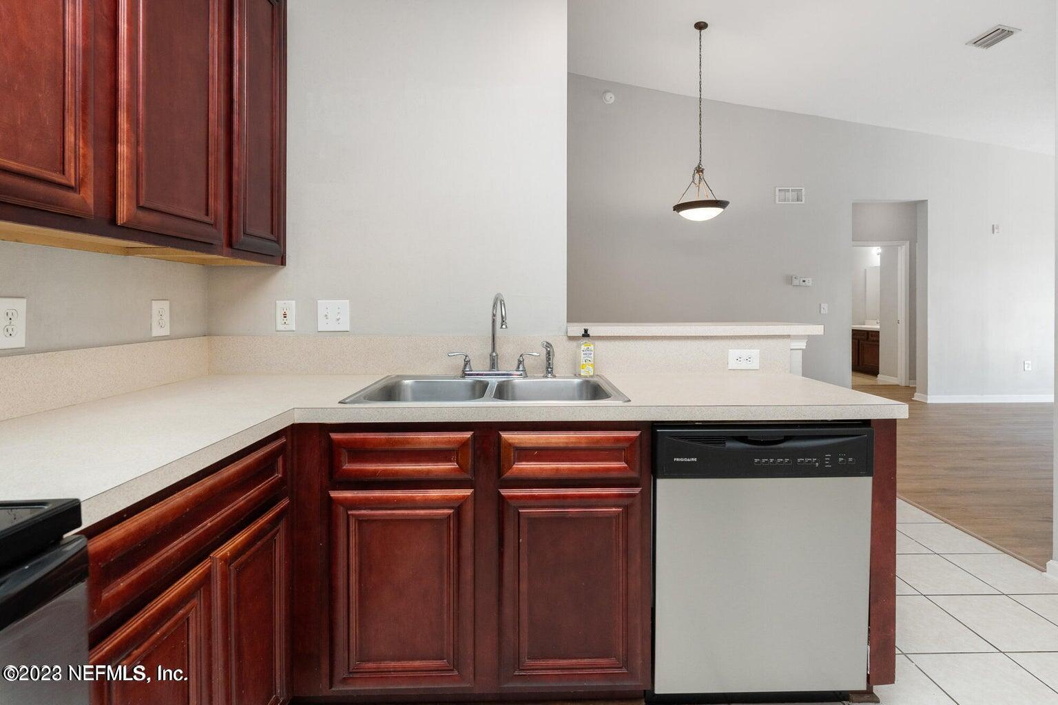 8226 Green Parrot Road, Unit 308 Jacksonville, FL 32256 - Photo 8 of 31 8 - Kitchen to Living