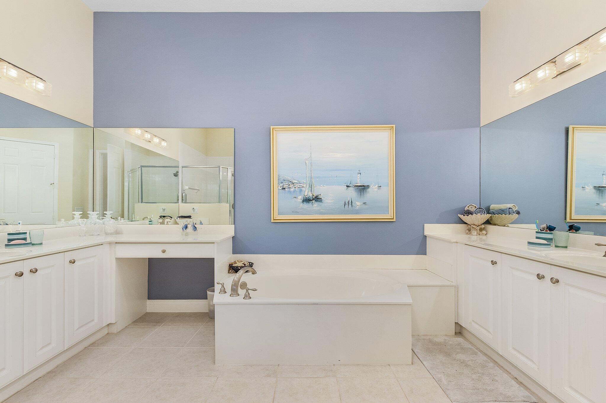 9283 Museo Circle, Unit 204 Naples, FL 34114 - Photo 11 of 23 a view of bathroom with dual sinks