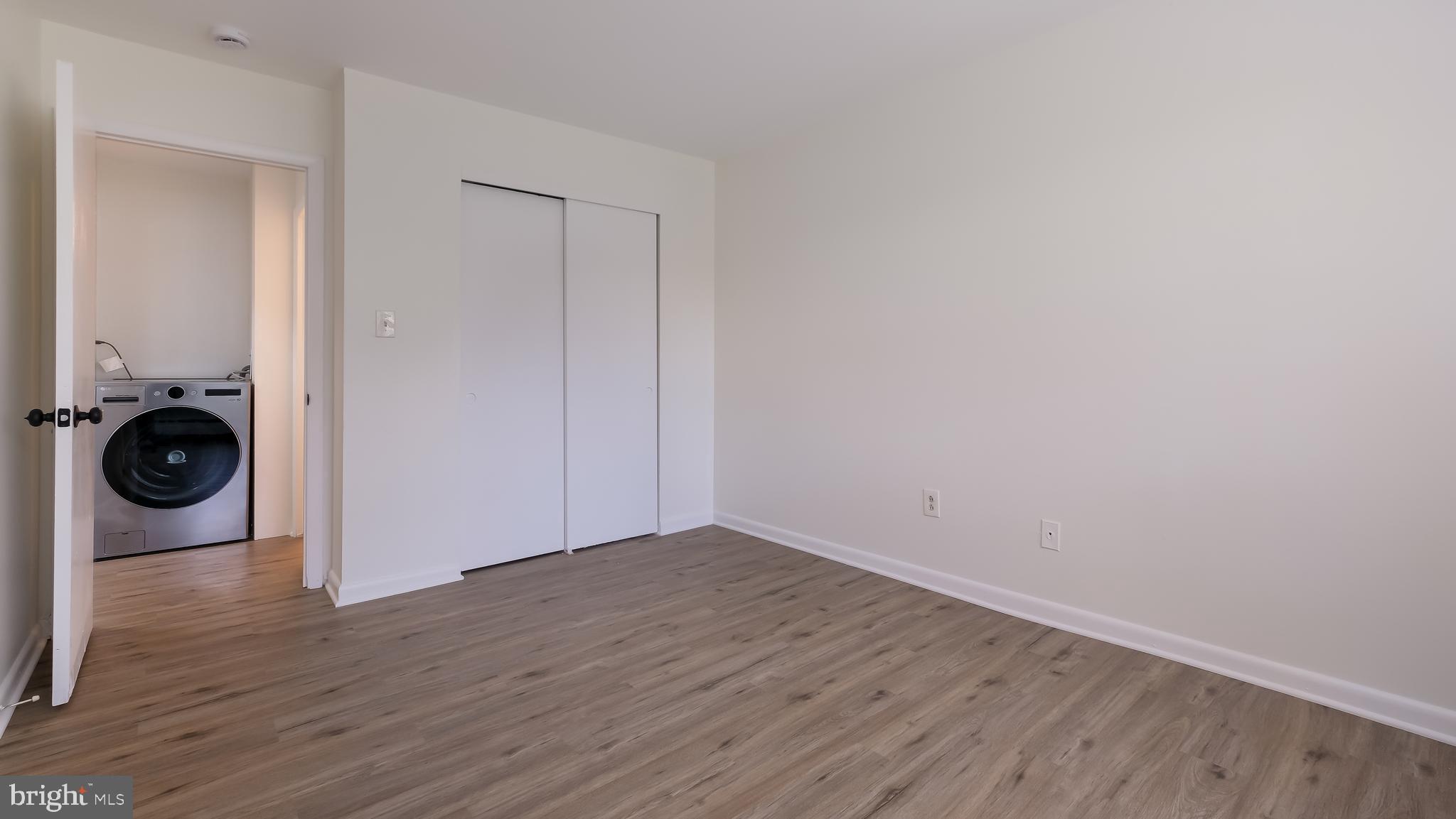4701 Pennell Road Aston, PA 19014 - Photo 15 of 24 a view of a livingroom with wooden floor and a ceiling fan