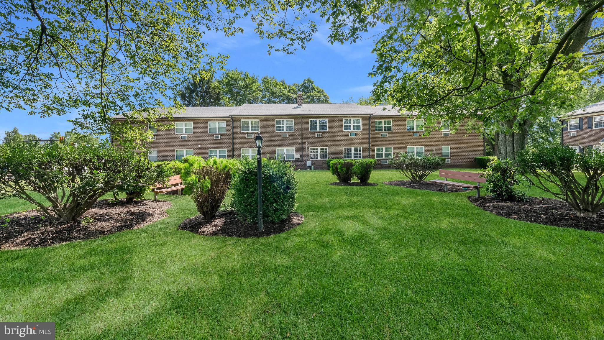 4701 Pennell Road Aston, PA 19014 - Photo 18 of 24 a view of a garden with a fountain