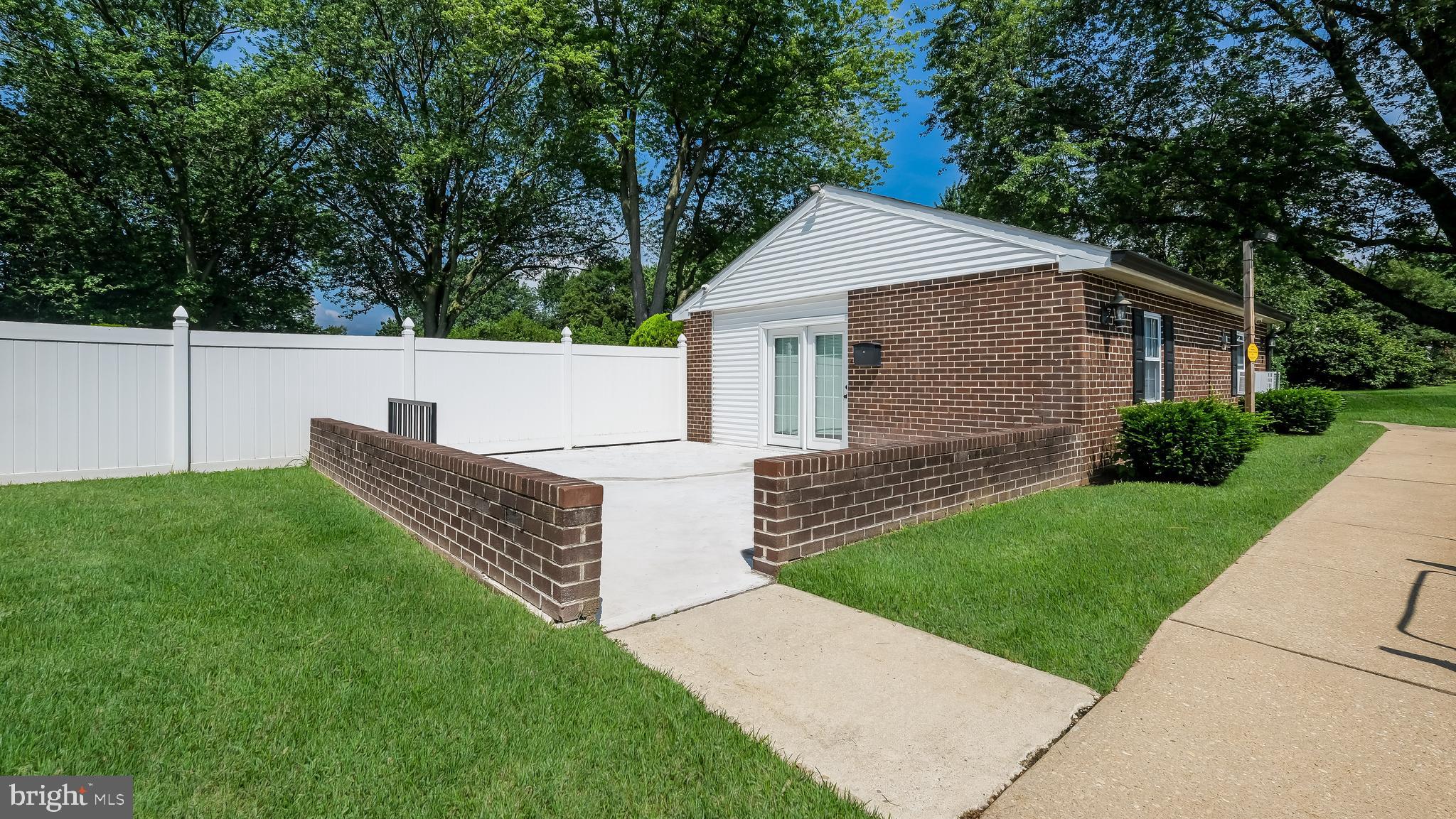 4701 Pennell Road Aston, PA 19014 - Photo 22 of 24 a view of a house with a yard