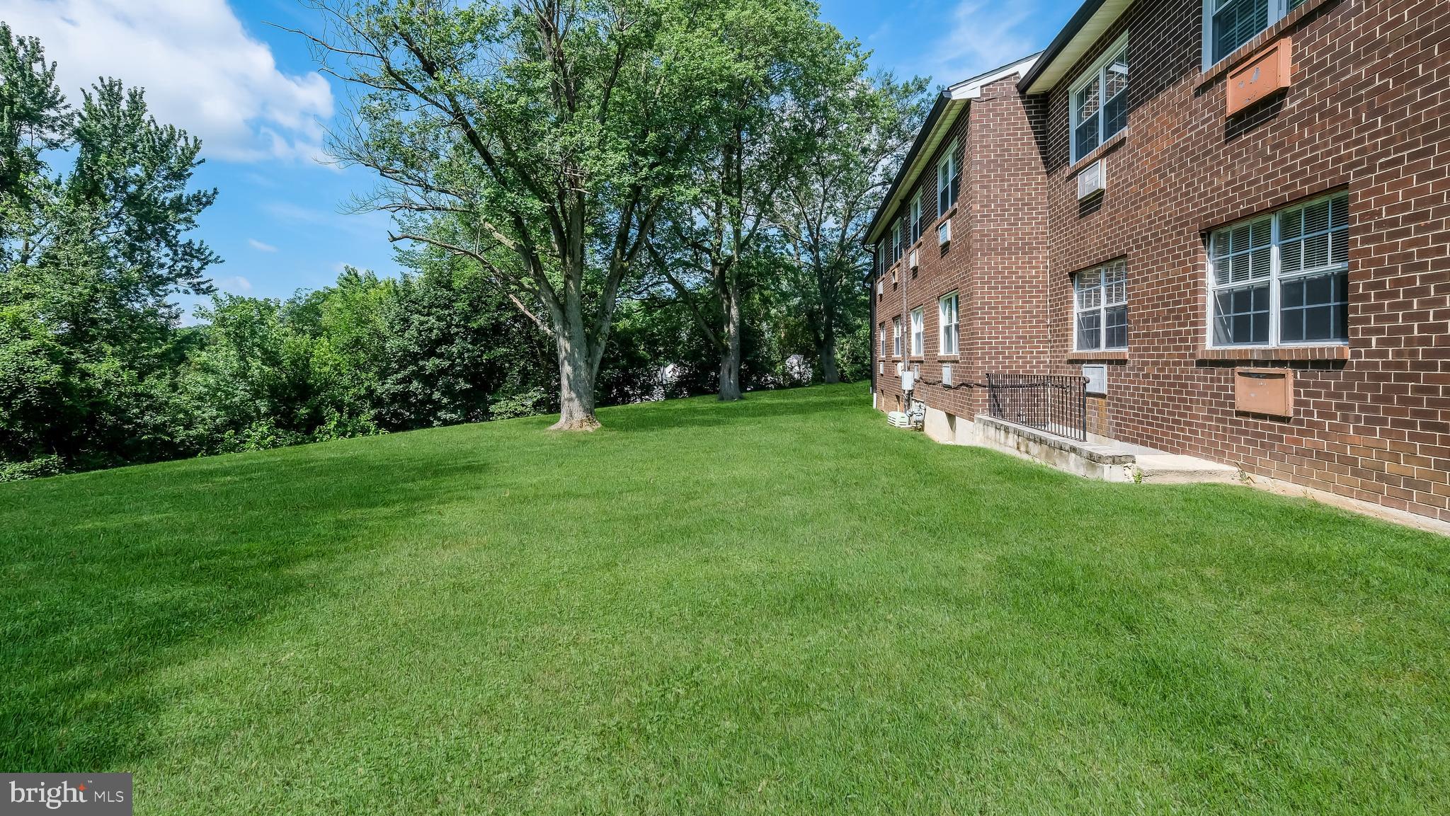4701 Pennell Road Aston, PA 19014 - Photo 24 of 24 a view of a backyard with a garden