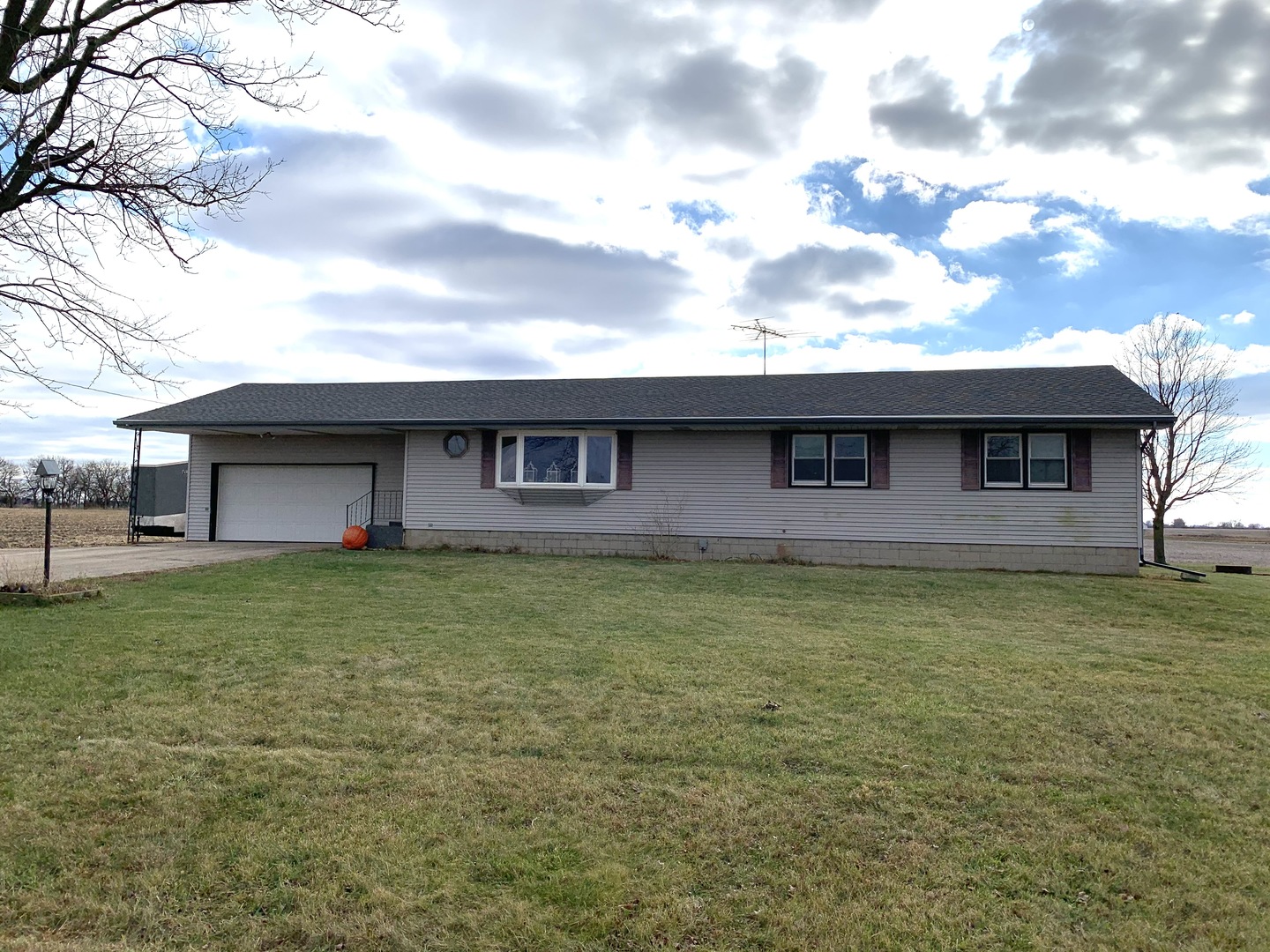 11624 Highway 17 Bonfield, IL 60913 - Photo 2 of 14 a view of a house with a backyard