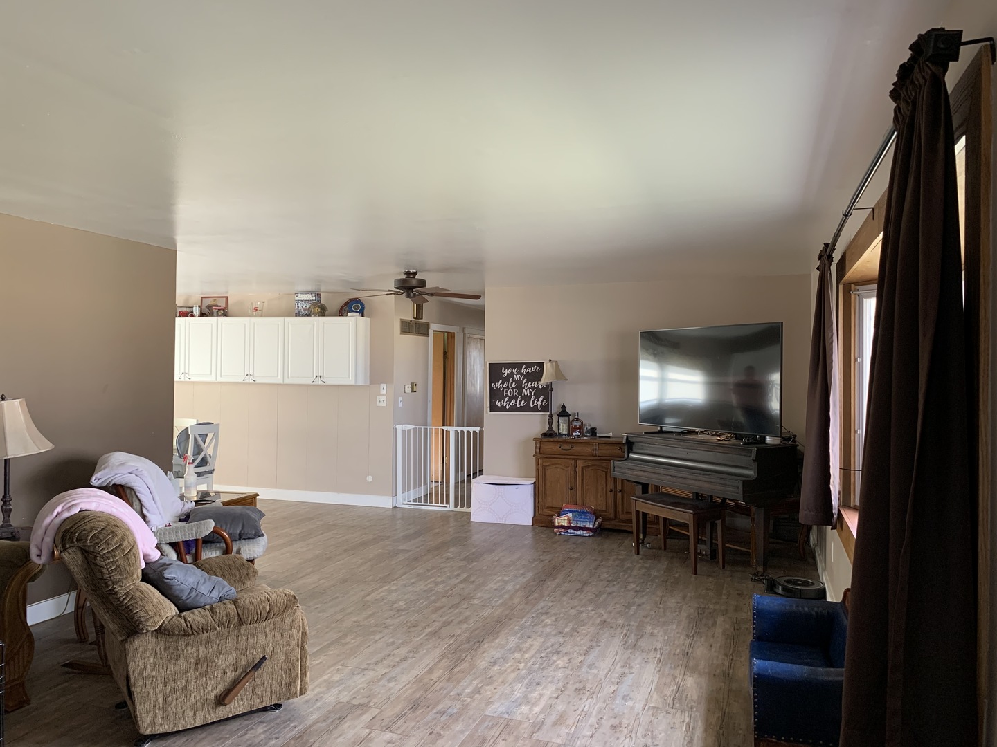 11624 Highway 17 Bonfield, IL 60913 - Photo 5 of 14 a living room with furniture and a flat screen tv