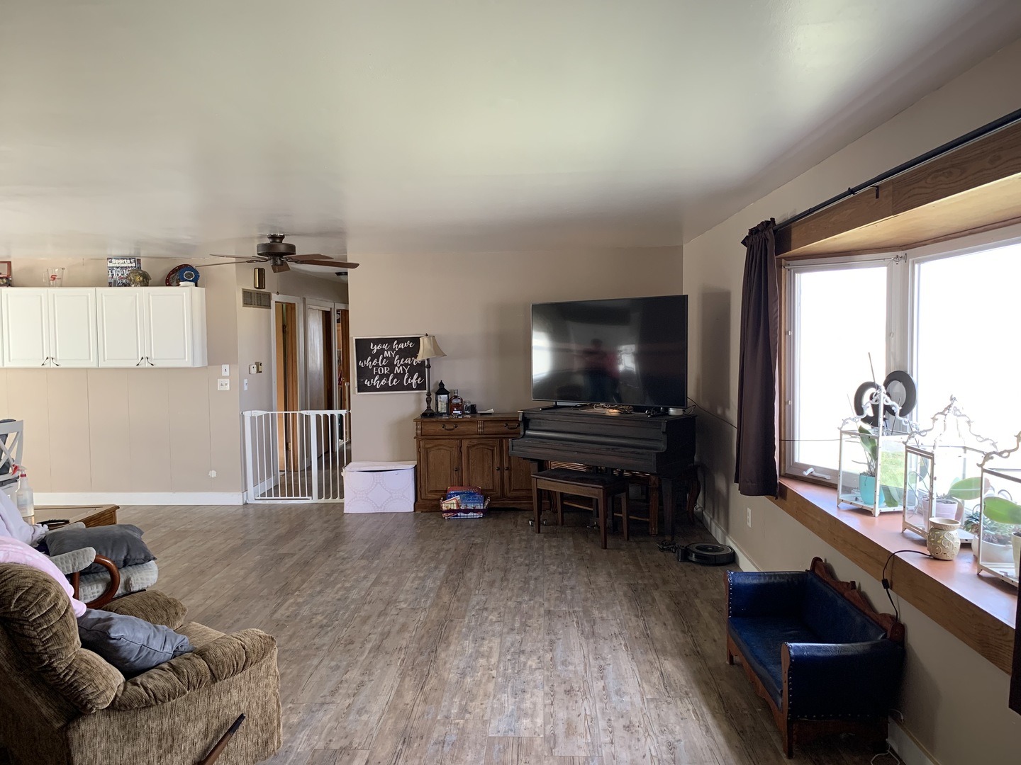 11624 Highway 17 Bonfield, IL 60913 - Photo 6 of 14 a living room with furniture and a flat screen tv