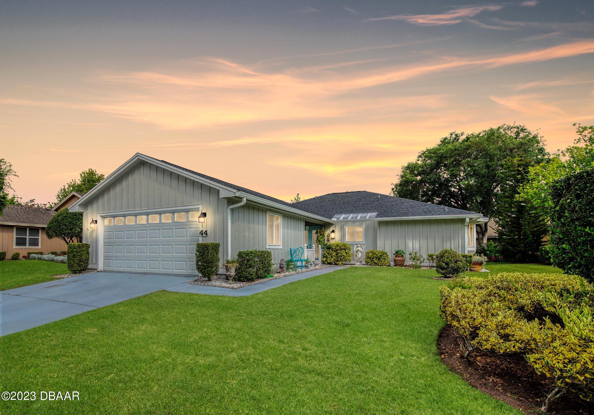 44 Treetop Circle Ormond Beach, FL 32174 - Photo 2 of 43 44TreetopCircle_Dusk