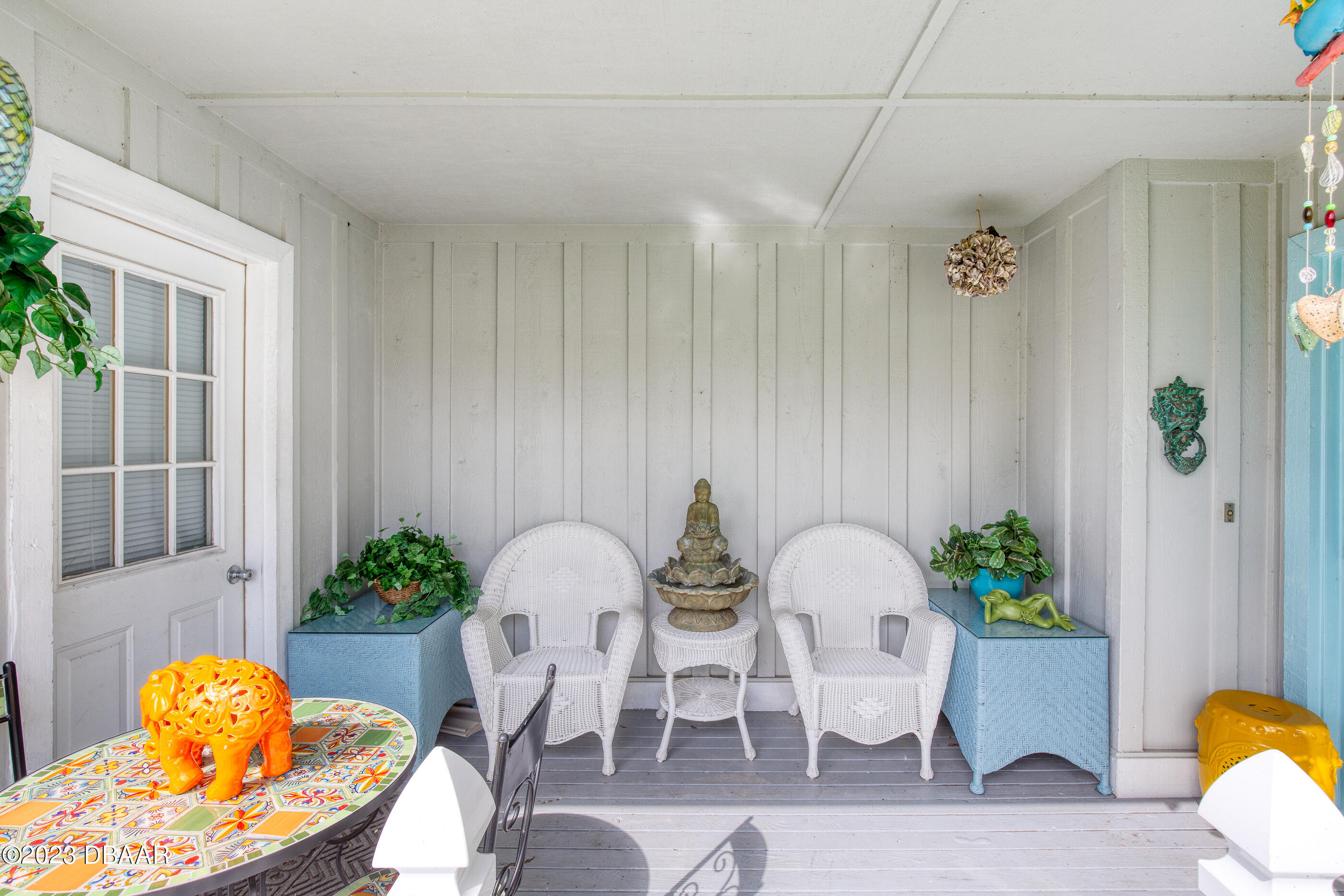 44 Treetop Circle Ormond Beach, FL 32174 - Photo 31 of 43 Front Porch Sitting Area