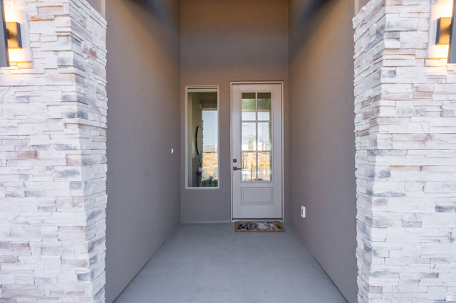 2972 West 570 North Hurricane, UT 84737 - Photo 12 of 104 Doorway to property featuring stucco siding