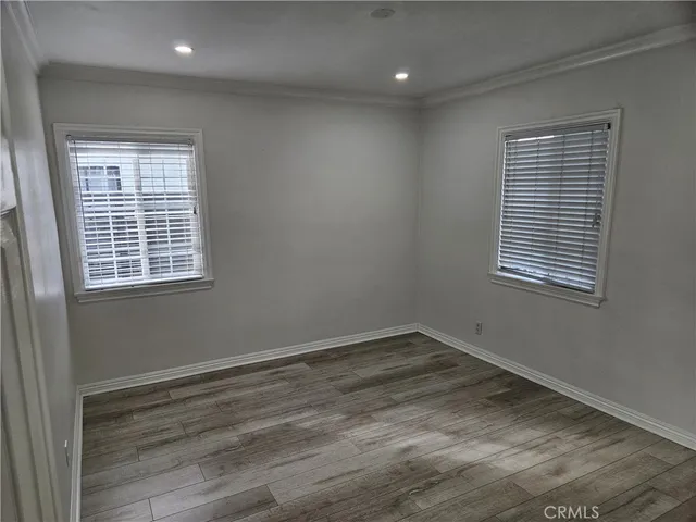 a view of a room that has a window in it
