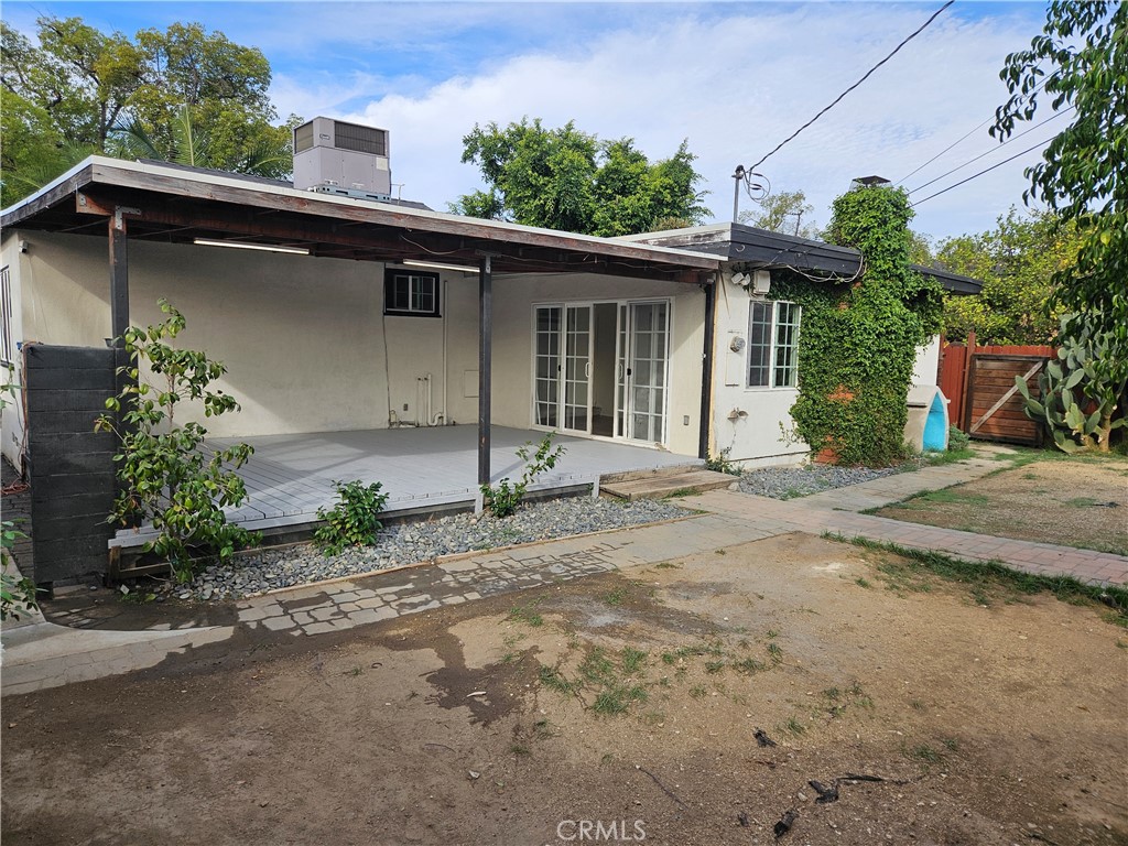 8030 Lemona Avenue Panorama City, CA 91402 - Photo 27 of 29 a front view of a house with garden