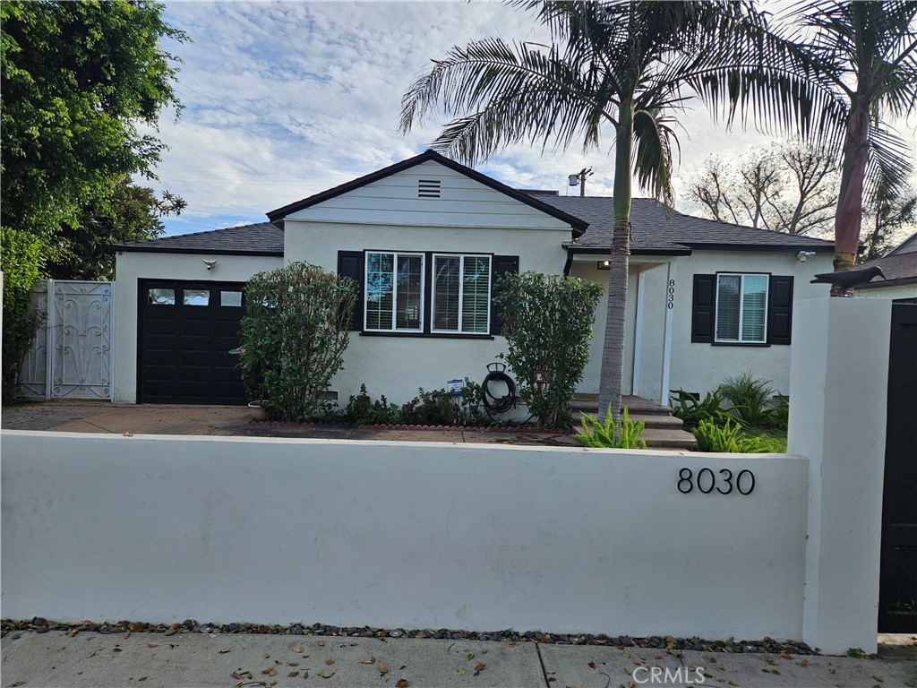 8030 Lemona Avenue Panorama City, CA 91402 - Photo 5 of 29 front view of a house with a yard