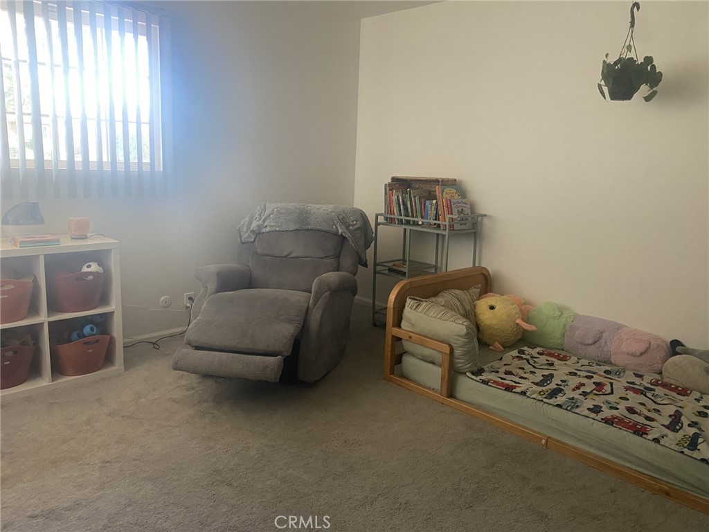 918 North Cleveland Street Orange, CA 92867 - Photo 4 of 5 a bedroom with a bed and cabinets