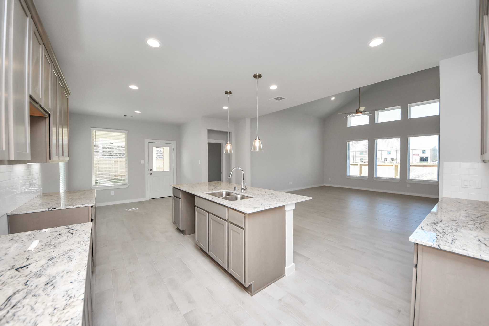 15807 Telge Ridge Lane Cypress, TX 77429 - Photo 14 of 45 a kitchen with stainless steel appliances granite countertop a stove and a sink
