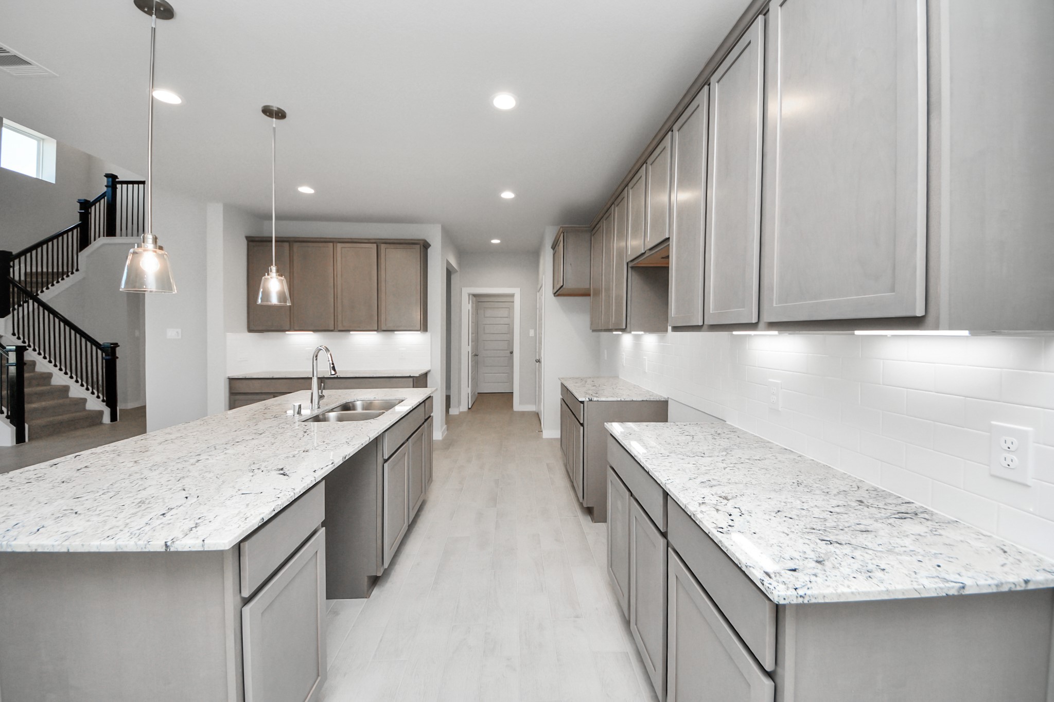 15807 Telge Ridge Lane Cypress, TX 77429 - Photo 15 of 45 a kitchen with stainless steel appliances granite countertop a sink stove and refrigerator