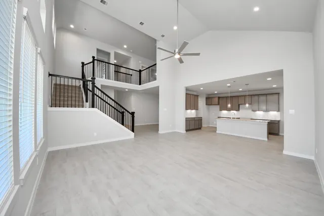 a view of kitchen and kitchen with a sink