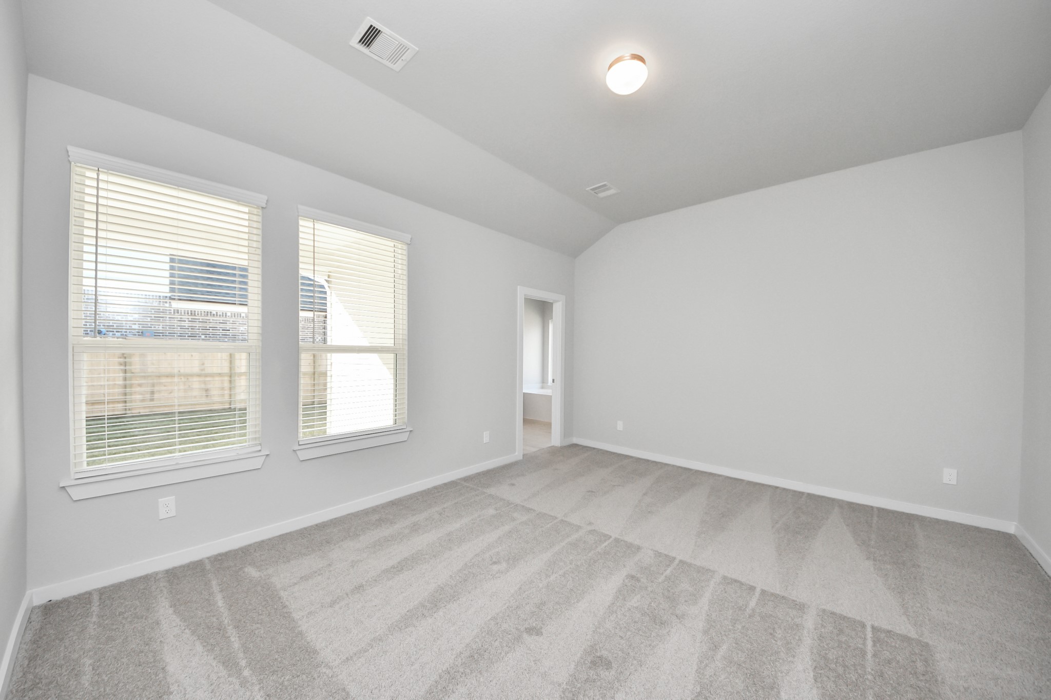 15807 Telge Ridge Lane Cypress, TX 77429 - Photo 24 of 45 an empty room with windows