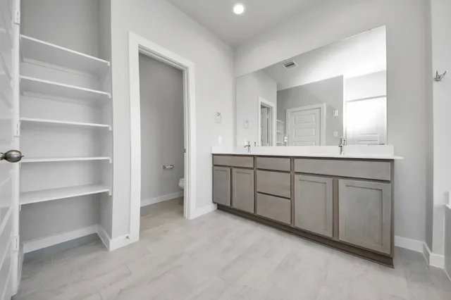 a view of a livingroom with a staircase and door