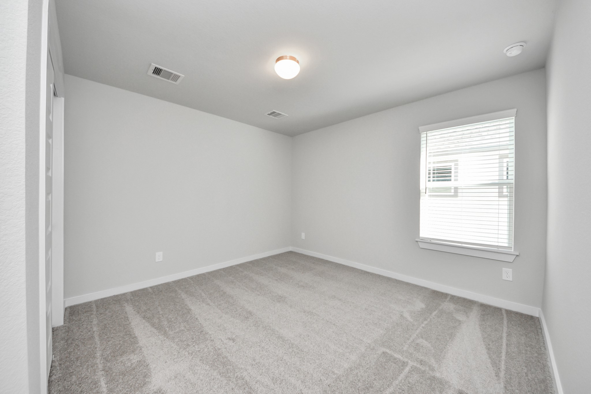 15807 Telge Ridge Lane Cypress, TX 77429 - Photo 34 of 45 an empty room with a window