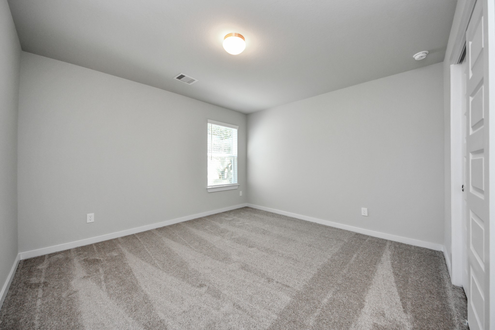 15807 Telge Ridge Lane Cypress, TX 77429 - Photo 35 of 45 an empty room with windows