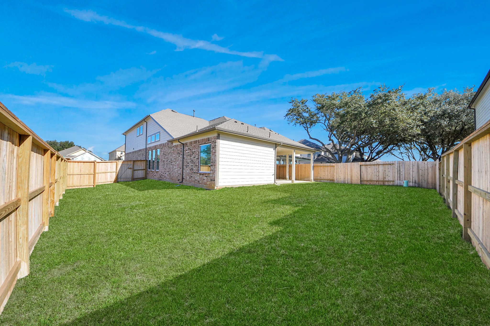 15807 Telge Ridge Lane Cypress, TX 77429 - Photo 40 of 45 a view of a backyard with a garden