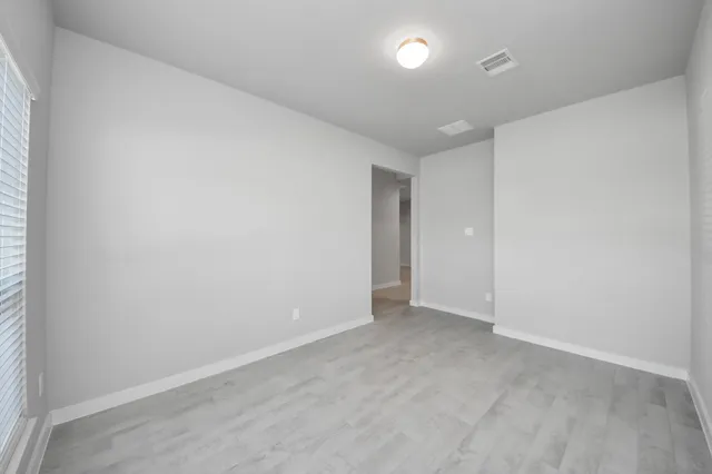 an empty room with an entryway