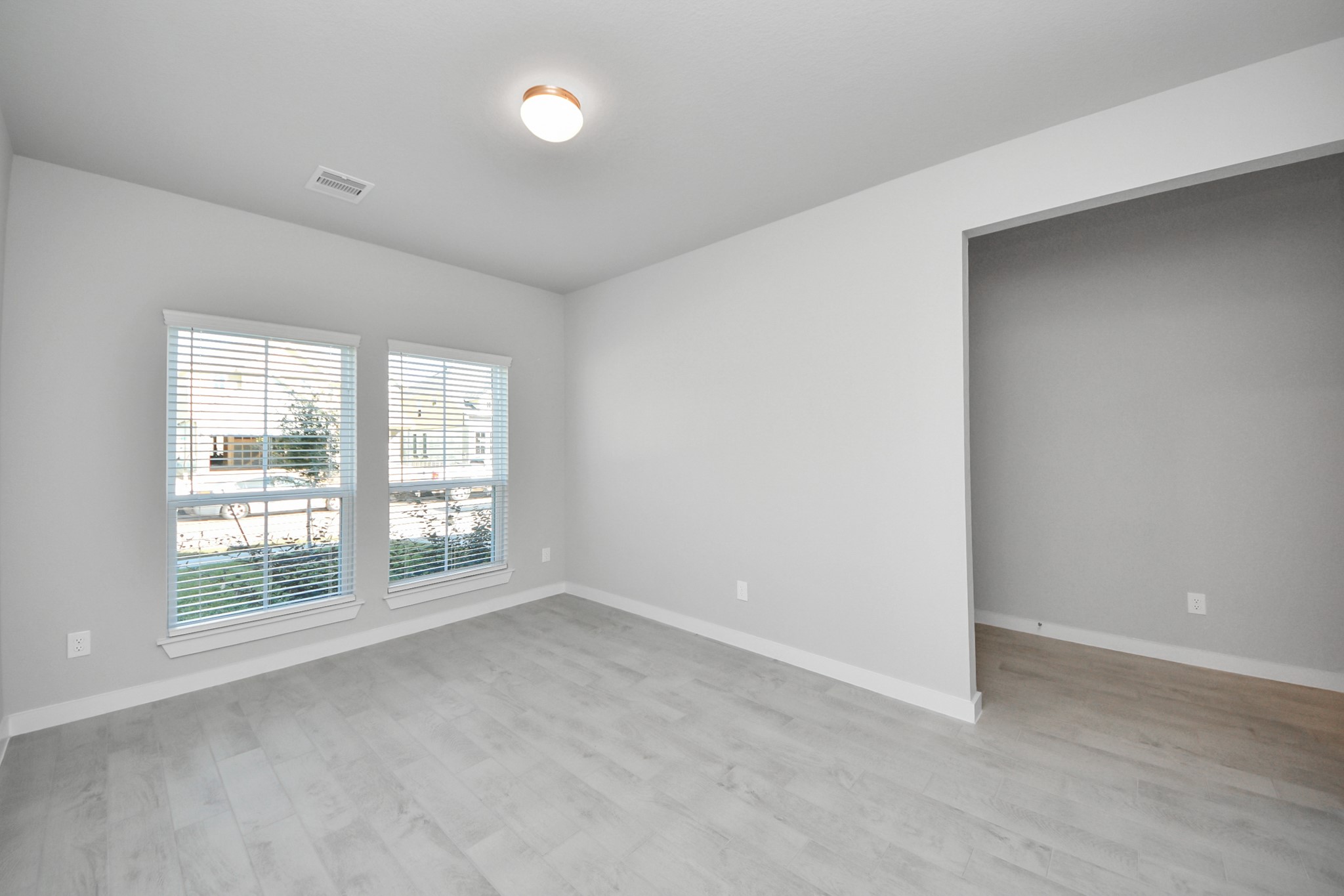 15807 Telge Ridge Lane Cypress, TX 77429 - Photo 7 of 45 an empty room with windows