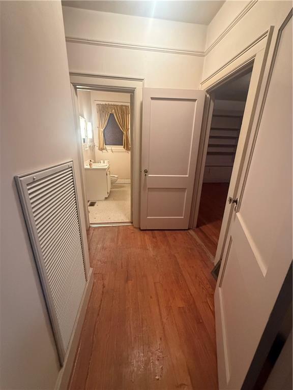 2808 Summerville Road Phenix City, AL 36867 - Photo 9 of 15 Corridor with light wood finished floors and a heating unit