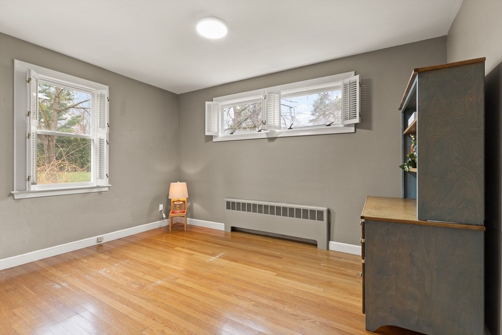 9 Jeffrey Road Wayland, MA 01778 - Photo 39 of 42 a view of empty room with wooden floor and fan