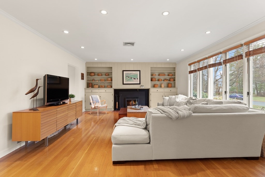 9 Jeffrey Road Wayland, MA 01778 - Photo 8 of 42 a living room with furniture and a flat screen tv