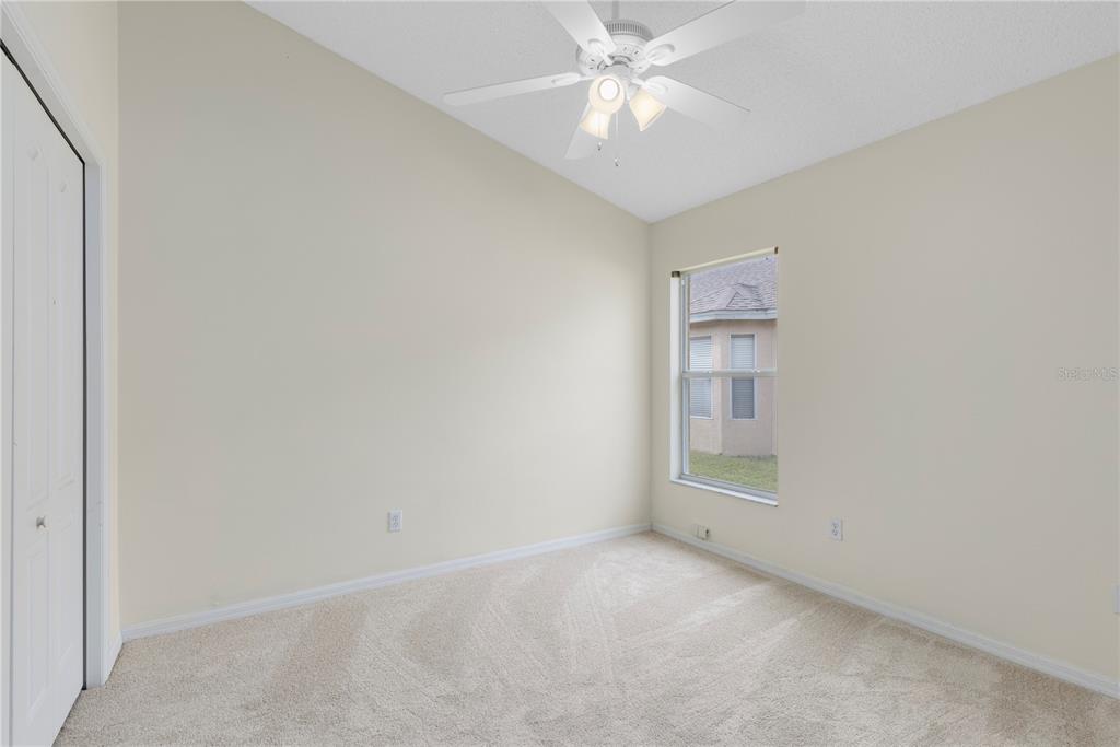 3640 Sickle Street Orlando, FL 32812 - Photo 12 of 21 an empty room with a view of a bathroom