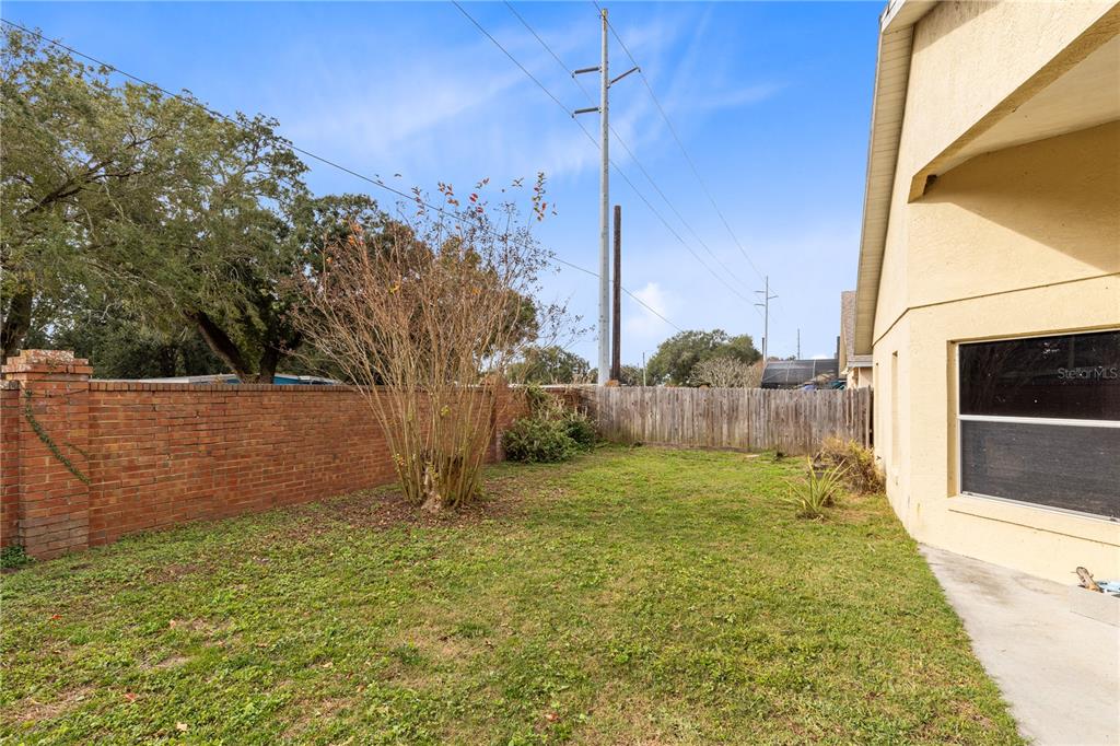 3640 Sickle Street Orlando, FL 32812 - Photo 17 of 21 a view of a backyard