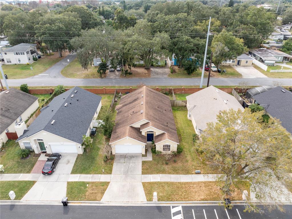 3640 Sickle Street Orlando, FL 32812 - Photo 19 of 21 an aerial view of residential houses with outdoor space