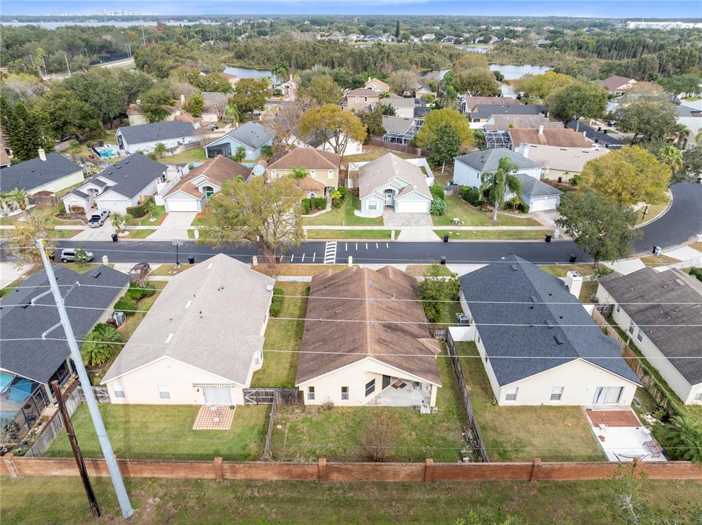 3640 Sickle Street Orlando, FL 32812 - Photo 20 of 21 an aerial view of residential houses with outdoor space and parking
