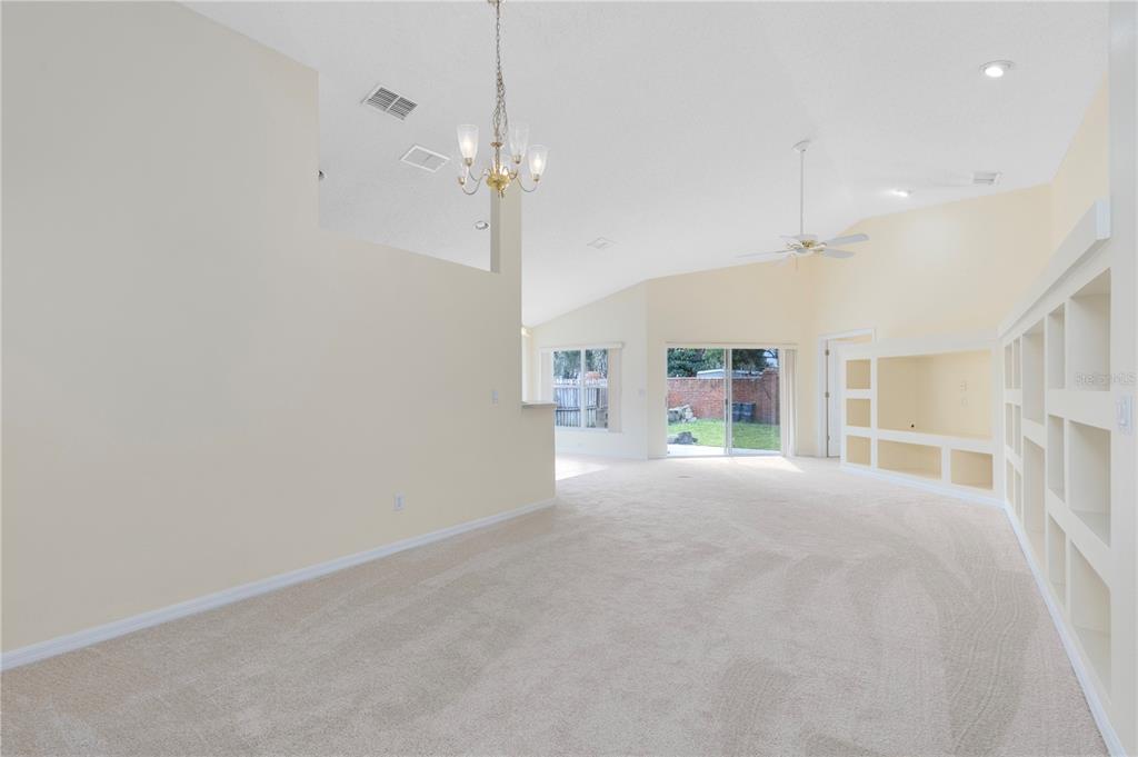 3640 Sickle Street Orlando, FL 32812 - Photo 2 of 21 a view of a house with a ceiling fan and window