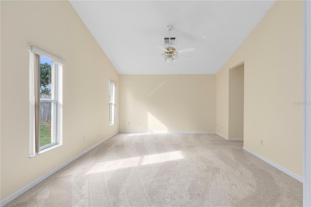 3640 Sickle Street Orlando, FL 32812 - Photo 9 of 21 a view of an empty room with a window