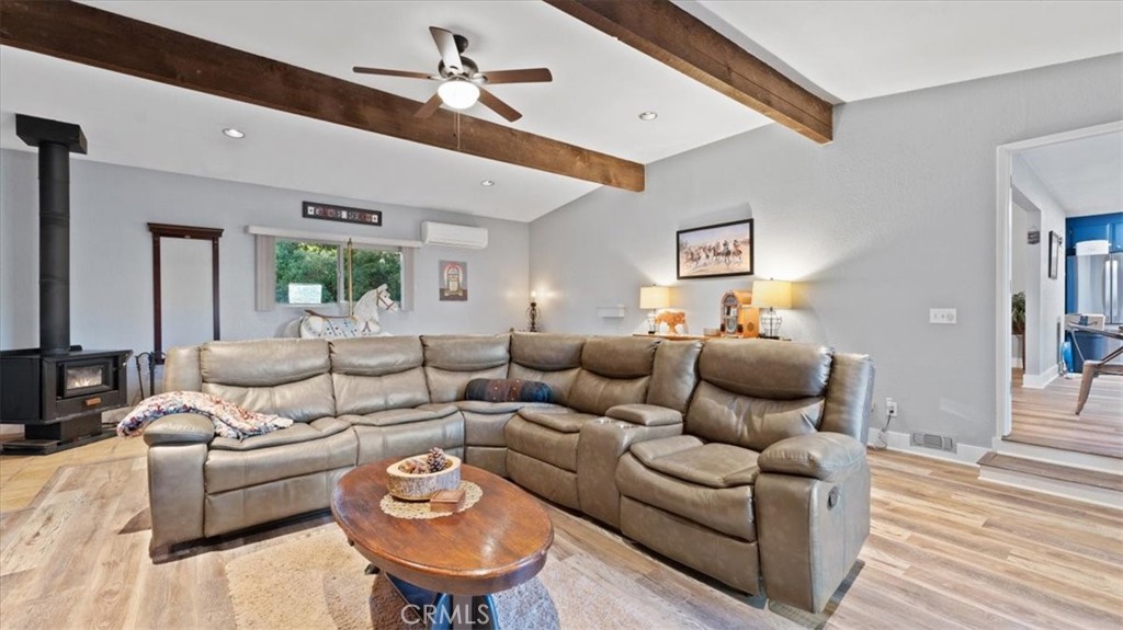 32 Mission Olive Road Oroville, CA 95966 - Photo 16 of 52 a living room with furniture and a wooden floor