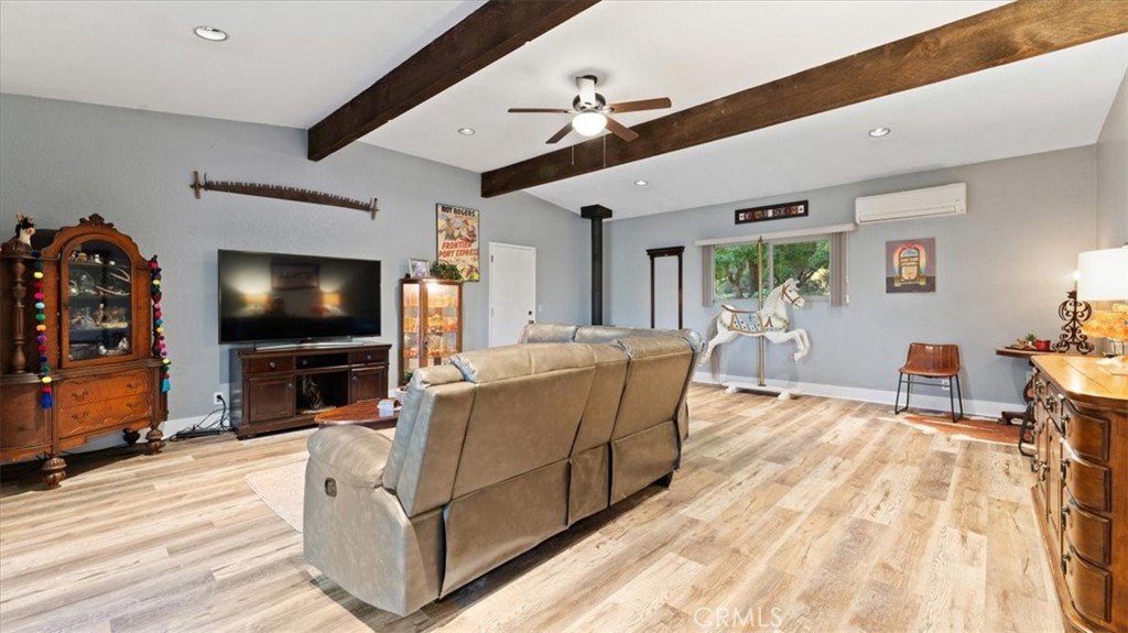 32 Mission Olive Road Oroville, CA 95966 - Photo 17 of 52 a living room with furniture and a flat screen tv