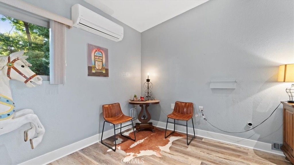 32 Mission Olive Road Oroville, CA 95966 - Photo 19 of 52 a chair and a table in a room