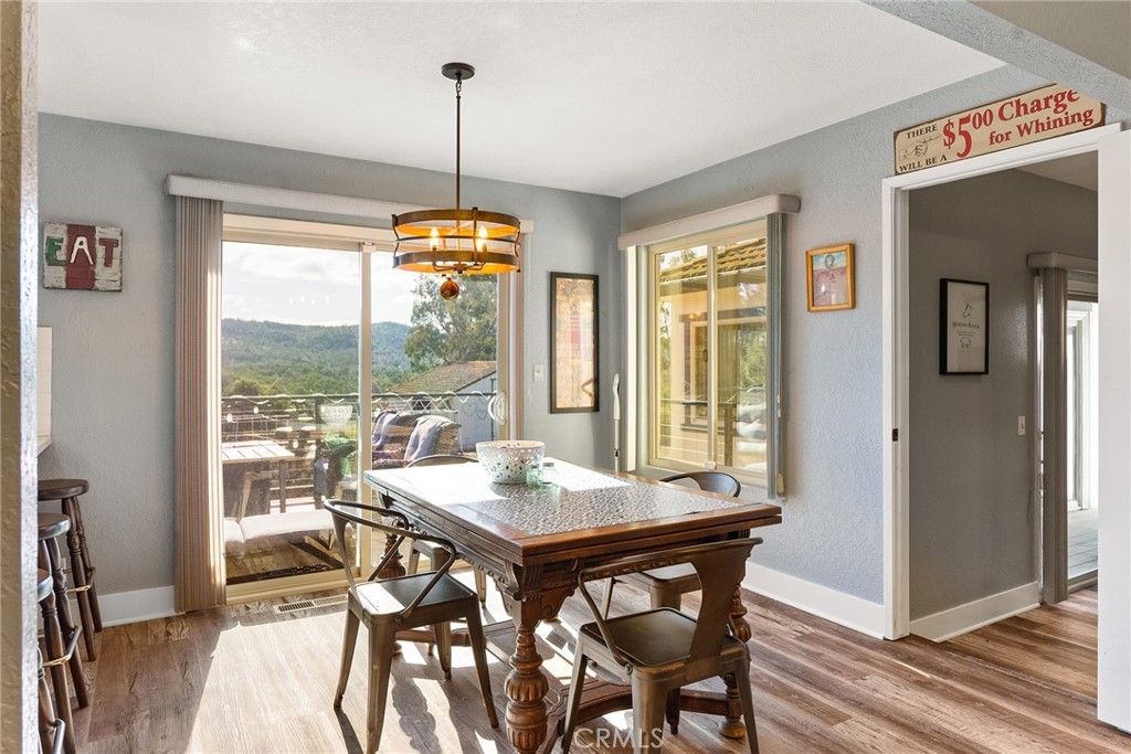 32 Mission Olive Road Oroville, CA 95966 - Photo 2 of 52 a view of a dining room with furniture window and outside view