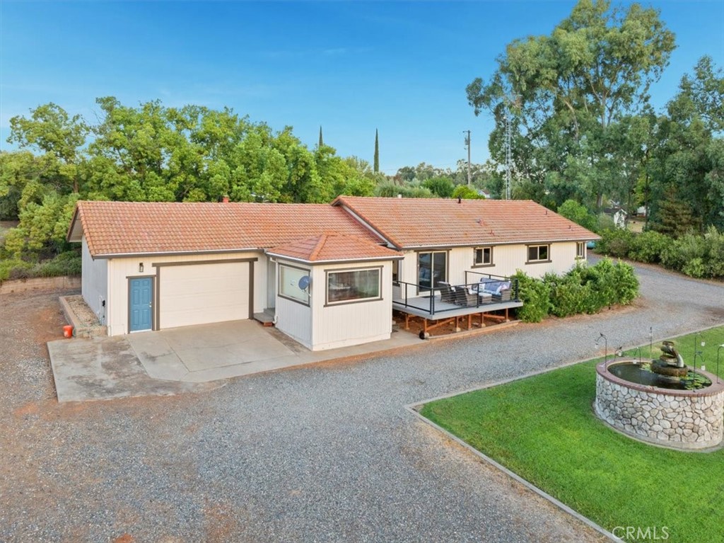 32 Mission Olive Road Oroville, CA 95966 - Photo 49 of 52 a view of a house with a yard and sitting area