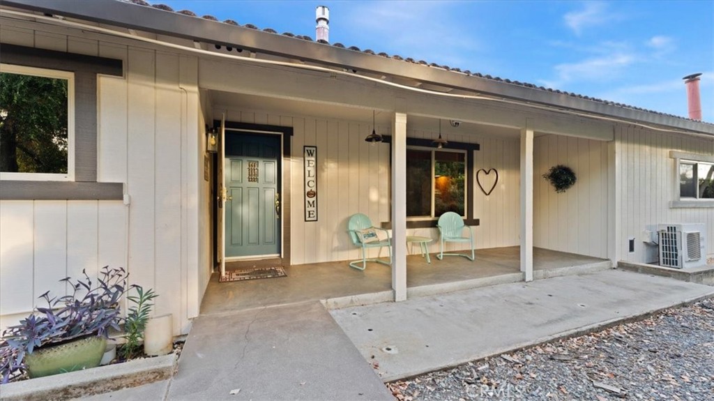 32 Mission Olive Road Oroville, CA 95966 - Photo 5 of 52 front view of a house with a chair