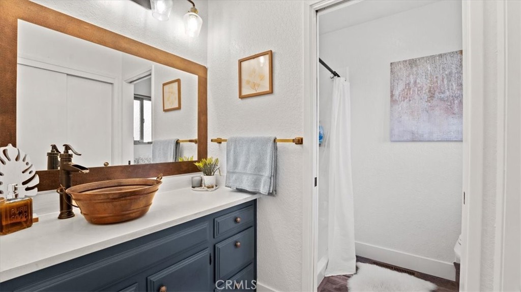 32 Mission Olive Road Oroville, CA 95966 - Photo 51 of 52 a bathroom with a sink and a mirror