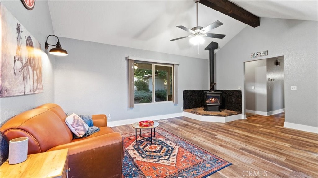 32 Mission Olive Road Oroville, CA 95966 - Photo 8 of 52 a living room with furniture and a fireplace