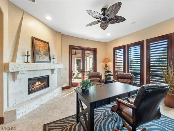 a kitchen with kitchen island granite countertop lots of counter top space and stainless steel appliances